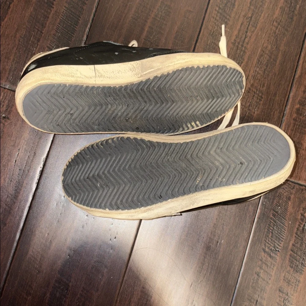 Golden Goose Superstar Black and Gold Sneakers with Leopard Print
